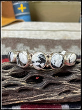 Load image into Gallery viewer, Priscilla Reeder, Navajo silversmith. Sterling silver and 5 white buffalo stone row bracelet. 
