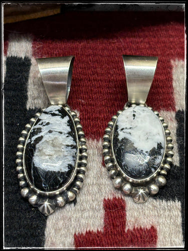 B. Yellowhorse, Navajo silversmith.  Sterling silver and White Buffalo pendants.