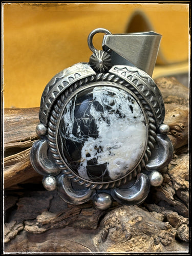 Juanita Long, Navajo silversmith. Sterling silver and White Buffalo pendant.