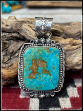 Load image into Gallery viewer, Rosella Paxson, Apache silversmith.  Sterling silver and Royston turquoise pendant. 
