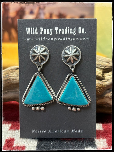 Robinson Martinez, Navajo silversmith.  Sterling silver and Kingman turquoise starshot earrings. 