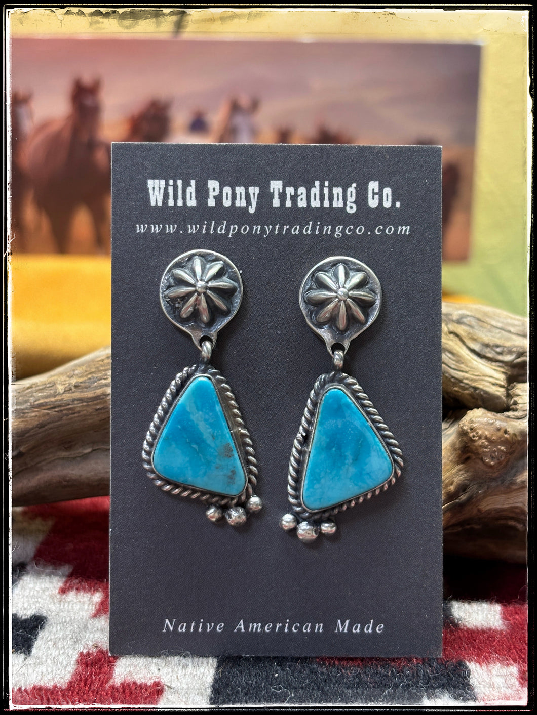 Robinson Martinez, Navajo silversmith.  Sterling silver and Kingman turquoise starshot earrings. 