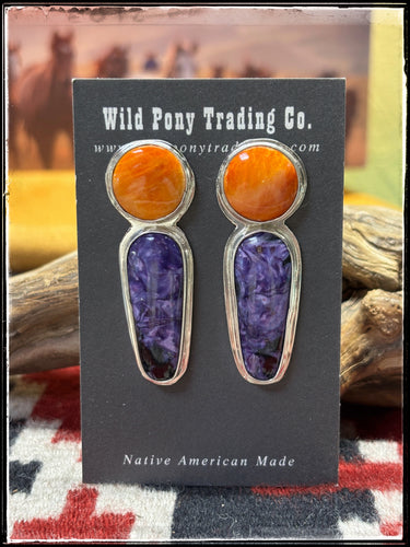 Sterling silver, orange spiny shell, and charoite earrings from Navajo silversmith Christine Jackson. 