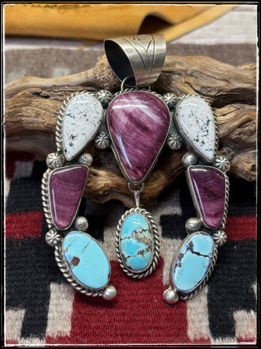 Augustine Largo, Navajo silversmith.  Estra large, Naja pendant with white buffalo, purple spiny shell, and golden Hills turquoise 