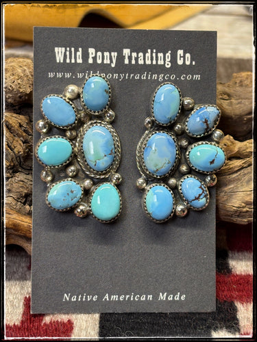 Ernest Bo Reeder, Navajo silversmith.  Sterling silver and Golden Hills turquoise, half cluster earrings.  