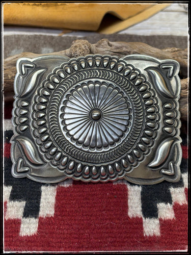 Leander Tahe, Navajo silversmith.  Sterling silver, heavy stamped large belt buckle.  