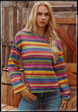 Load image into Gallery viewer, A bright and colorful geo sweater with a drop shoulder and bell sleeve.
