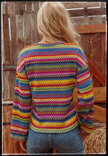 Load image into Gallery viewer, A bright and colorful geo sweater with a drop shoulder and bell sleeve.
