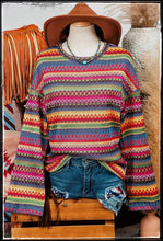 Load image into Gallery viewer, A bright and colorful geo sweater with a drop shoulder and bell sleeve.
