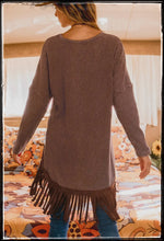 Load image into Gallery viewer, Brown, waffle knit top with high low hem and fringe on the hem.  Has drop shoulder and long sleeves. 
