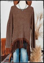 Load image into Gallery viewer, Brown, waffle knit top with high low hem and fringe on the hem.  Has drop shoulder and long sleeves. 
