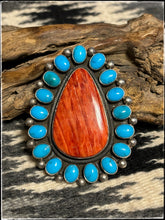 Load image into Gallery viewer, Sterling silver, Sleeping Beauty turquoise, and orange spiny oyster shell ring from Navajo silversmith Ernest Roy Begay. 
