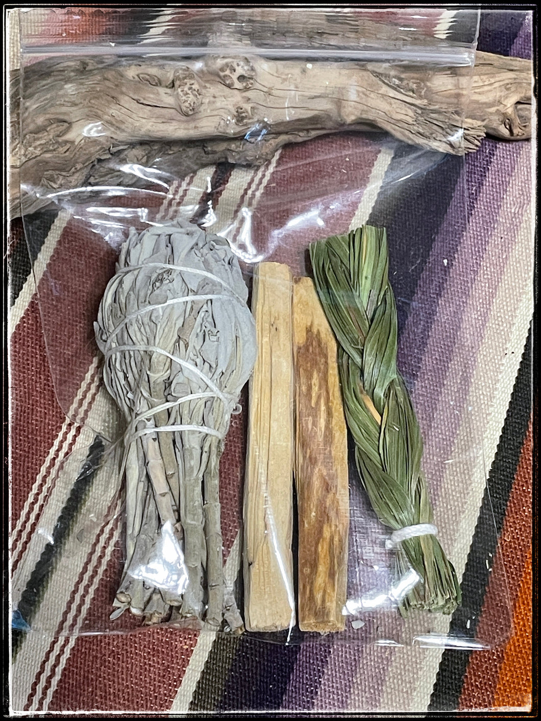 trio of White Sage, Palo Santo, and braided Sweetgrass help with protection, purification, healing, and blessings