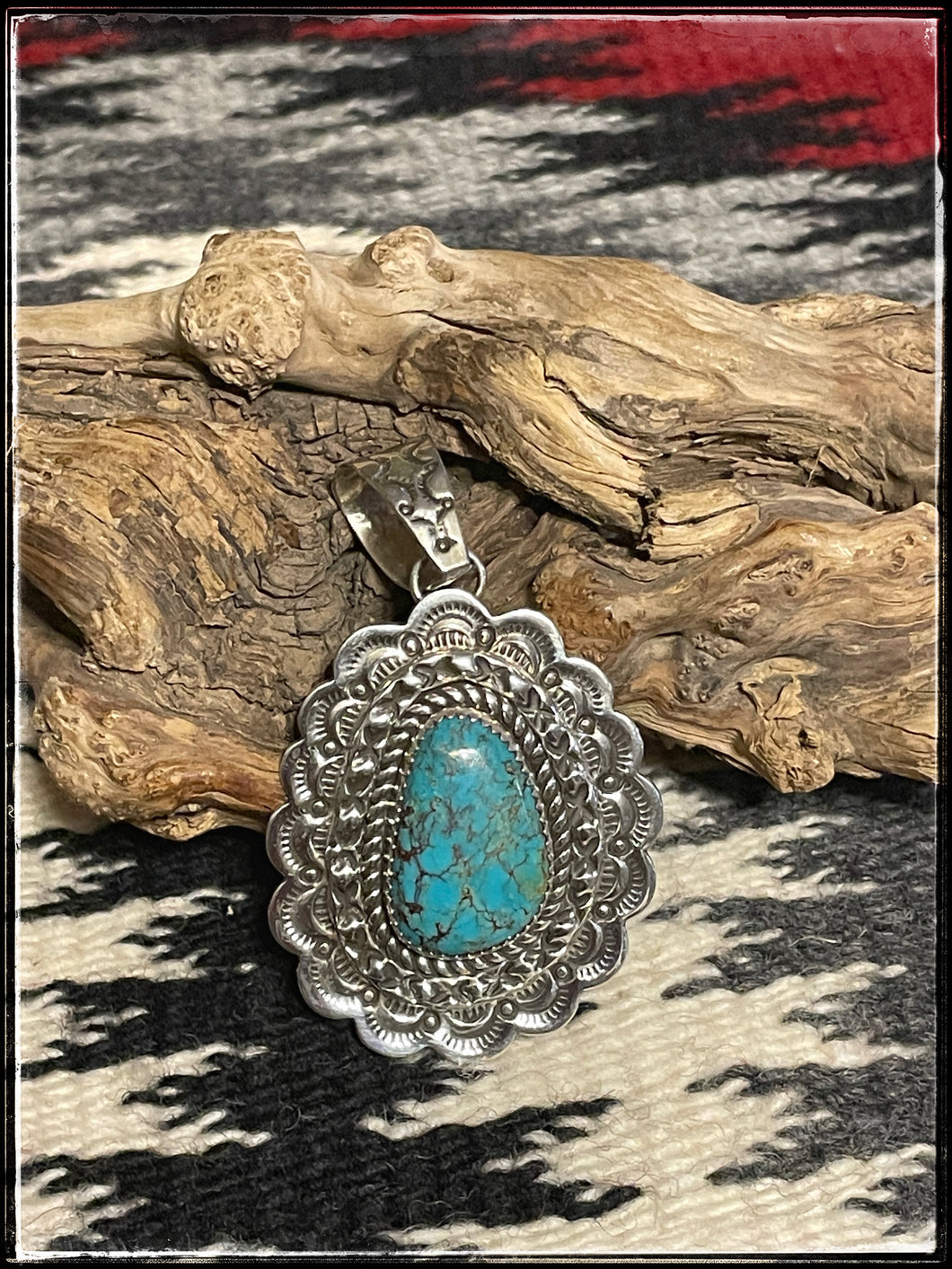 EC Navajo made, sterling silver and turquoise pendant