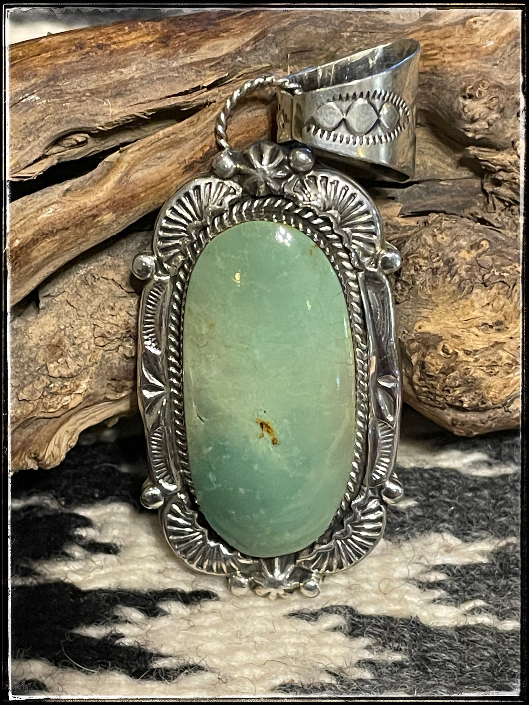 Sterling silver and turquoise pendant from Running Bear Studio